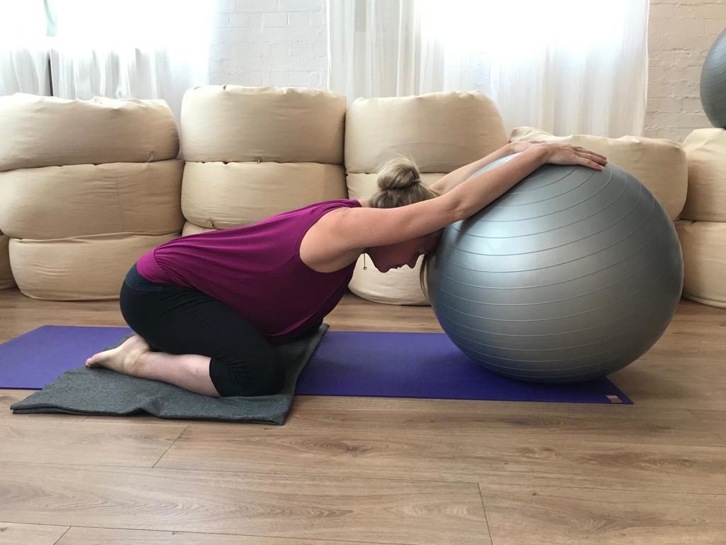 Active Birth Centre - Yoga Pose: Child's Pose Over a Ball - Active